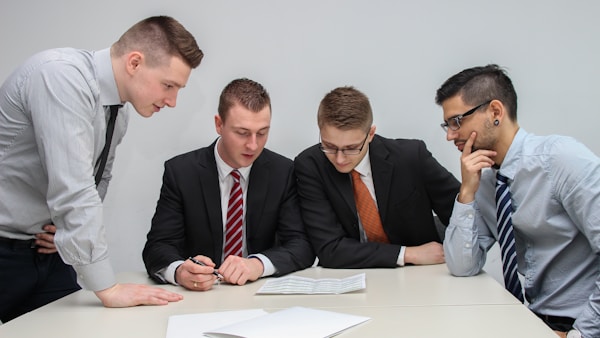 European business professionals reviewing compliance